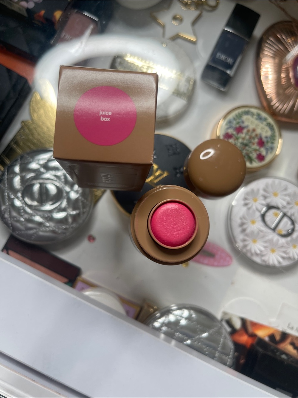 Rhode pocket blush in juice box hot pink